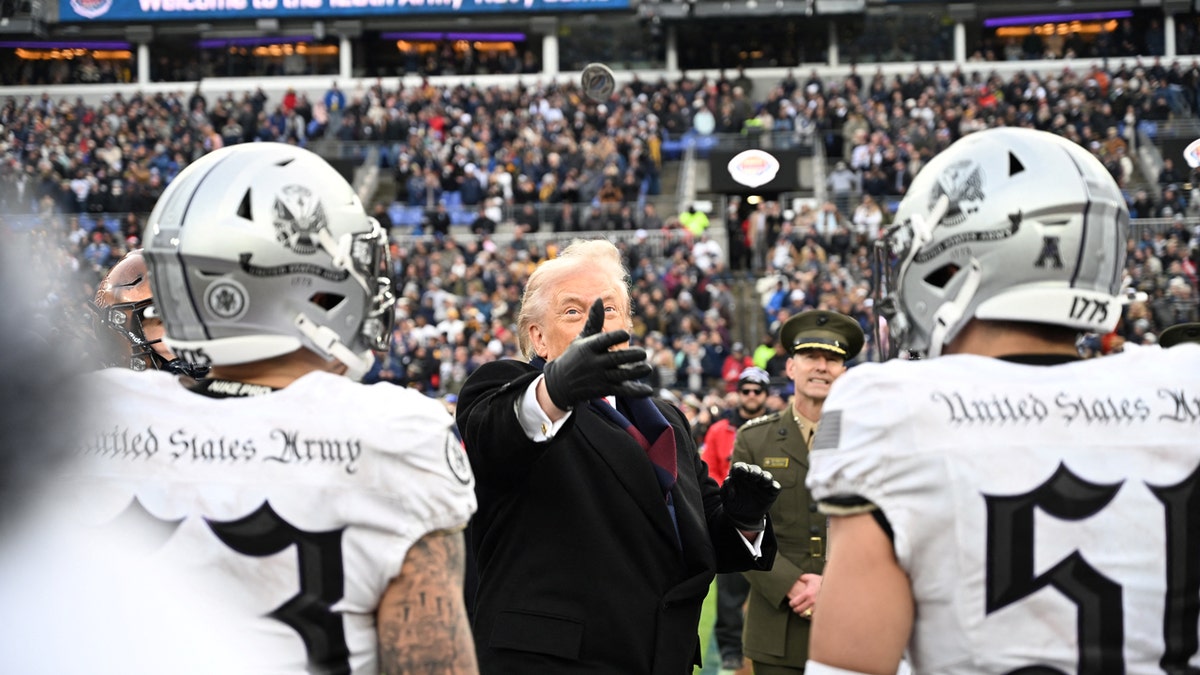 President Donald Trump does the coin toss at the Army vs. Navy game