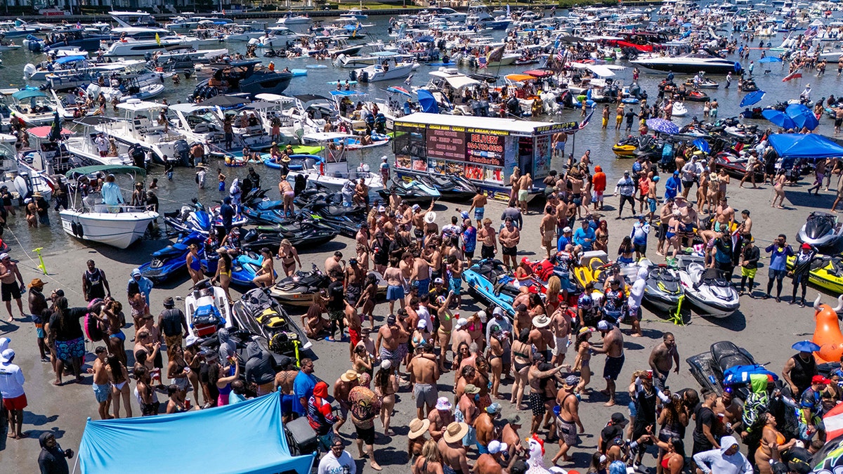 Spring breakers crowd the shore in Florida.