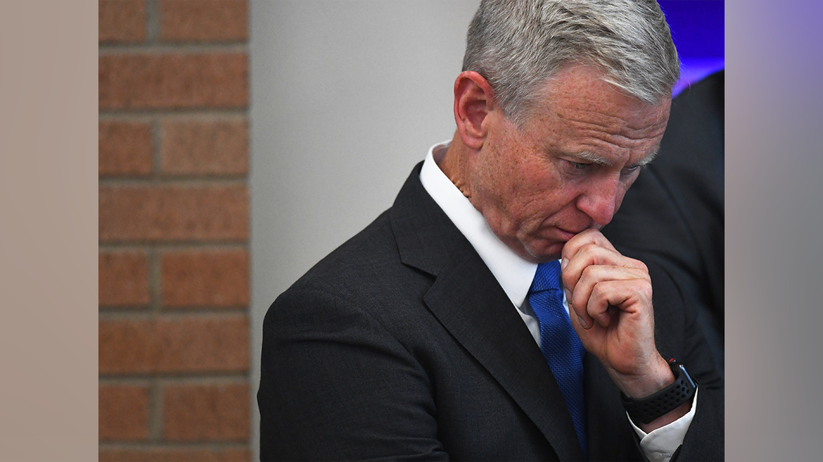 George Brauchler looking down.