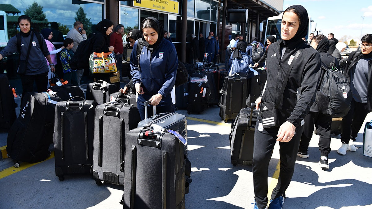 Iran's women's soccer team at the airport