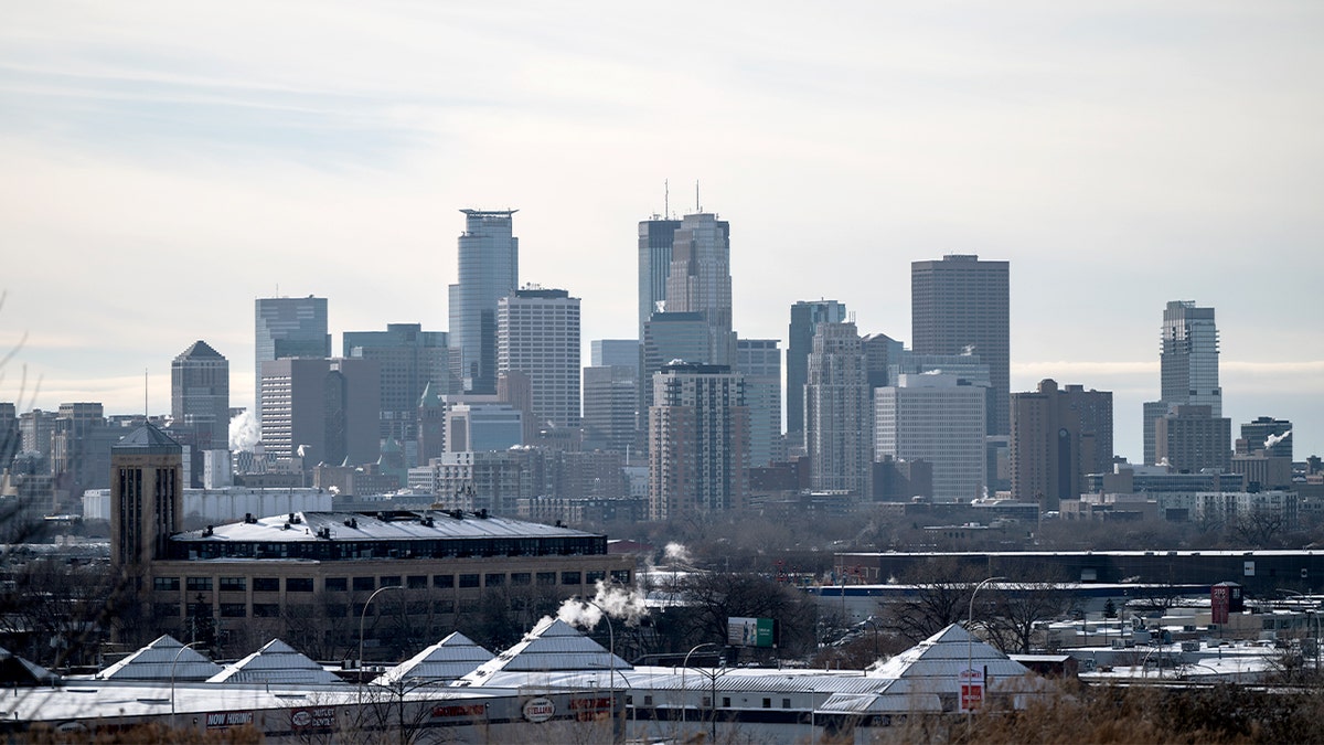 Minneapolis skyline and downtown buildings under winter conditions.
