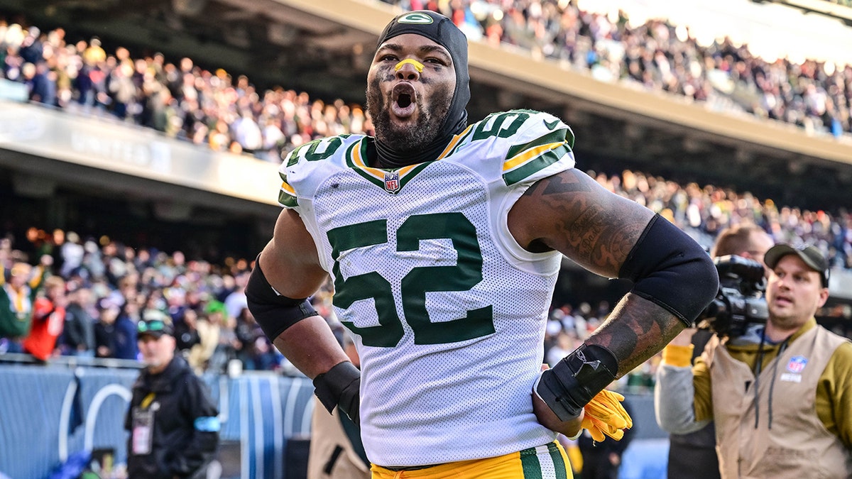 Rashan Gary celebrates off the field