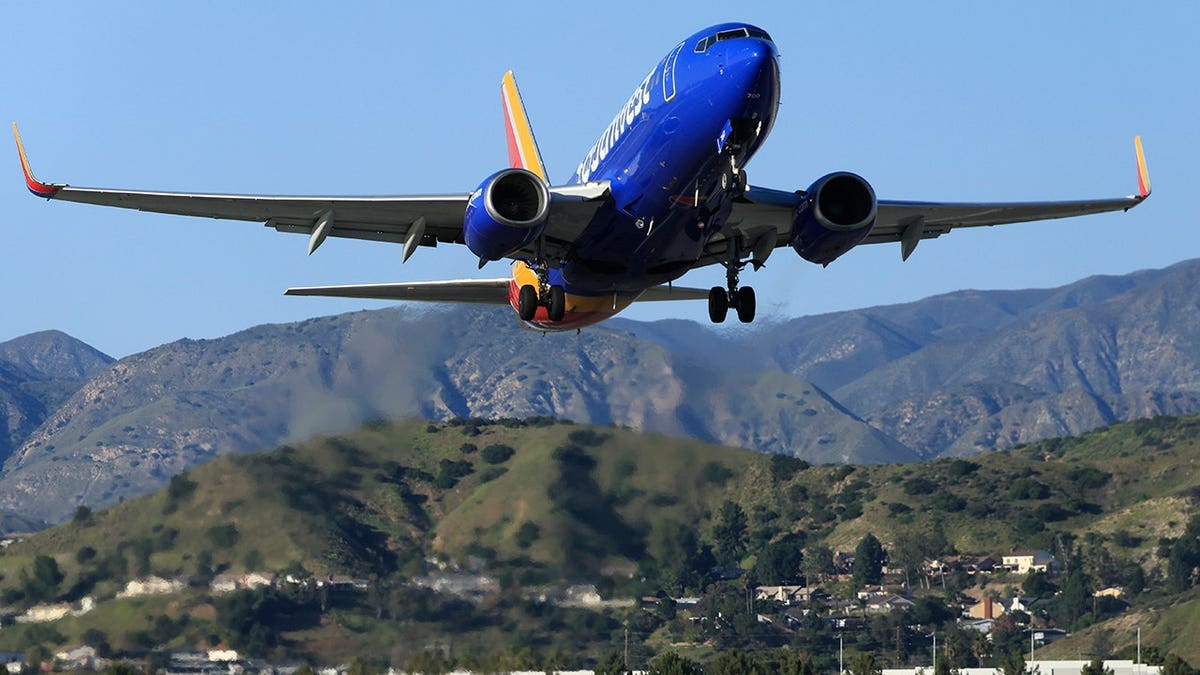 A Southwest Airlines plane taking off from Hollywood Burbank Airport.