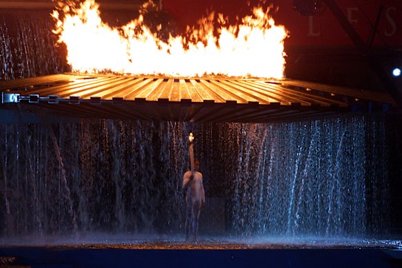 Heart-stopping: Cathy Freeman after lighting the flame.