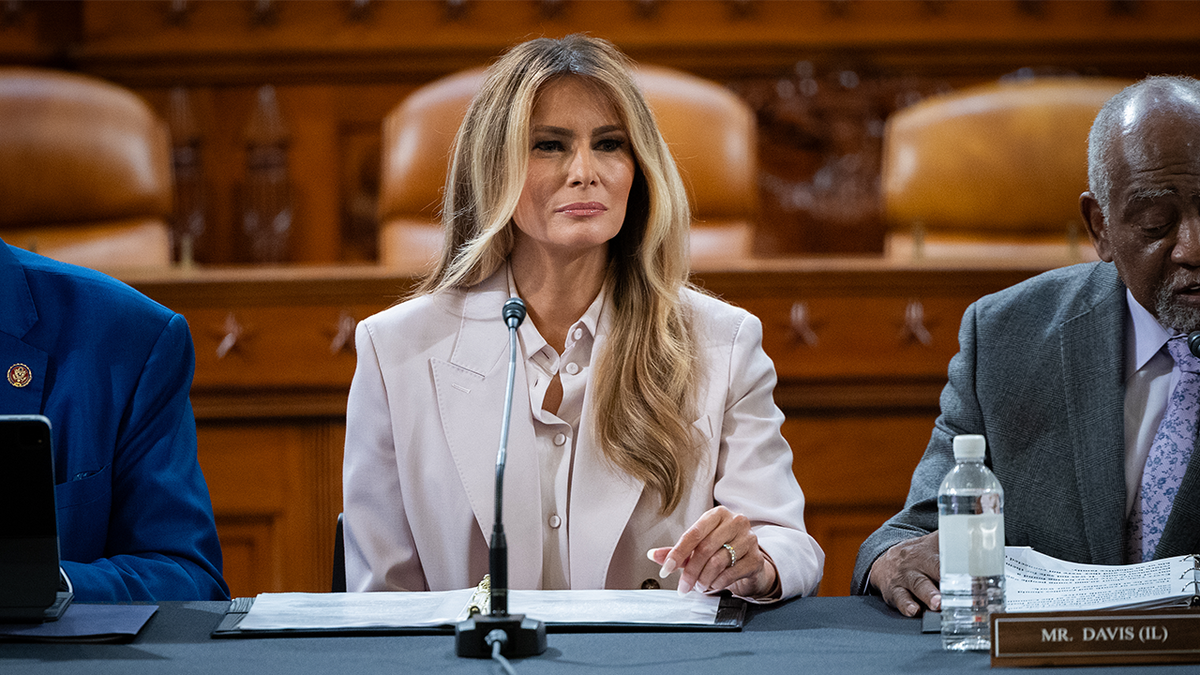 First lady Melania Trump listens as Congressman Danny Davis (D-IL) gives opening remarks at a roundtable discussion.