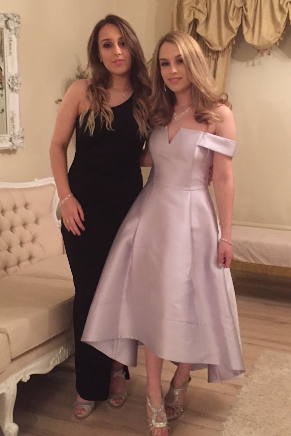 Krystal and Stephanie in 2017, dressed for a university ball.