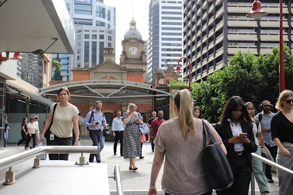 Commuters arriving in the Brisbane CBD on Wednesday morning. 
