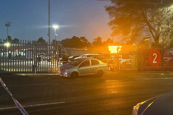 A damaged car outside Melbourne Showgrounds.