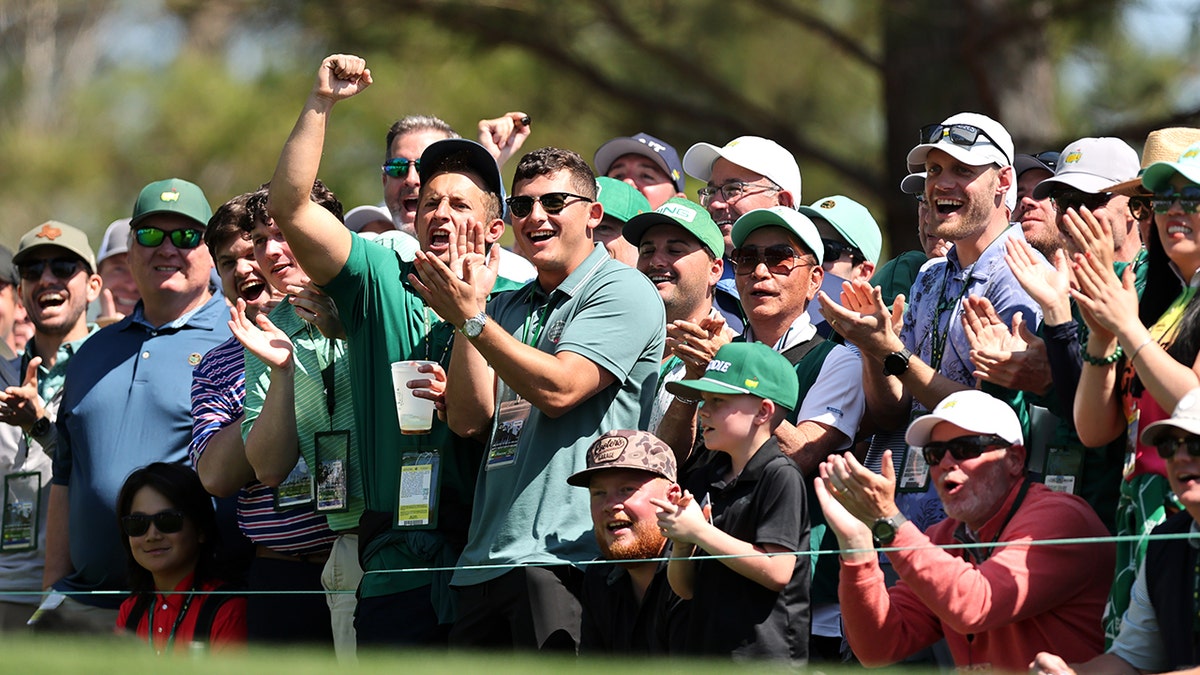Augusta National Golf Club entrance with signage about low food prices during Masters Tournament