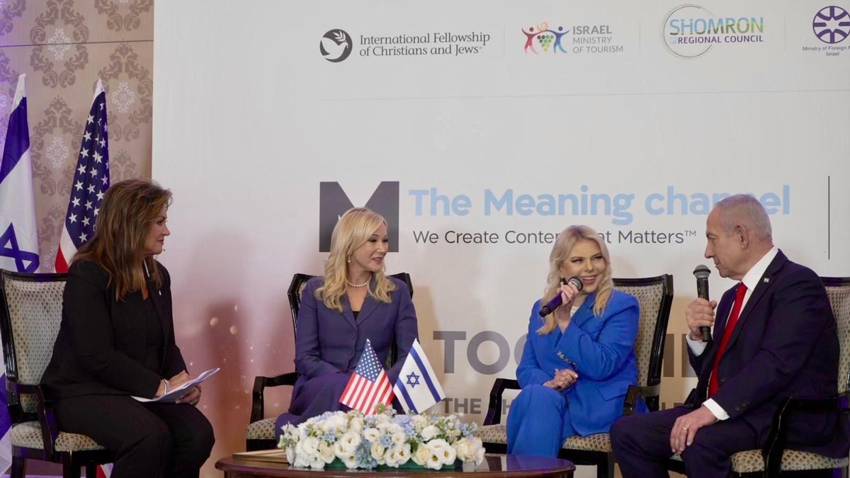 Pastor Paula White-Cain, spiritual adviser to President Donald Trump, meets Prime Minister Benjamin Netanyahu and his wife Sara at Daystar's "Together As One" event in Jerusalem, as part of a visit organized by Niv Jacobi, President of The Meaning Channel.