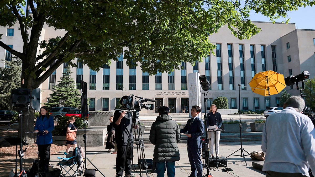 Cole Allen standing outside the E. Barrett Prettyman United States Court House in Washington, D.C.