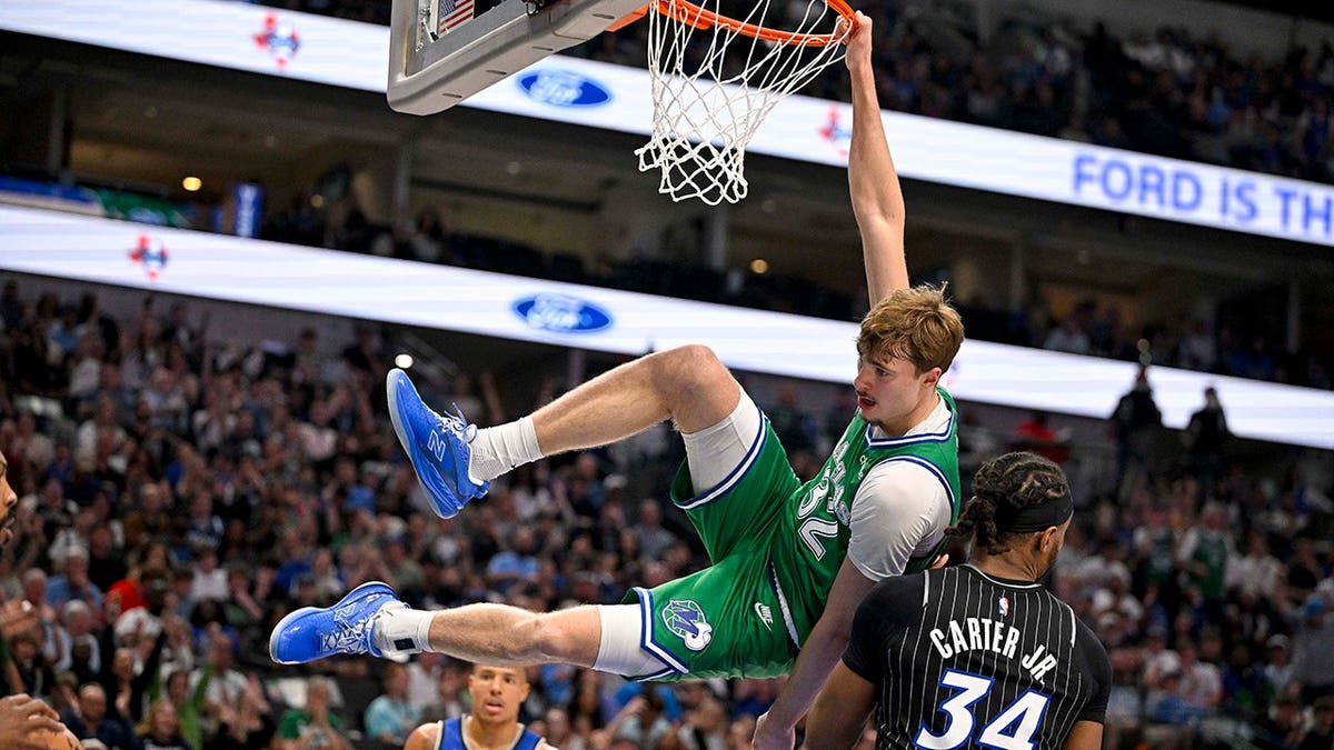 Dallas Mavericks forward Cooper Flagg dunks
