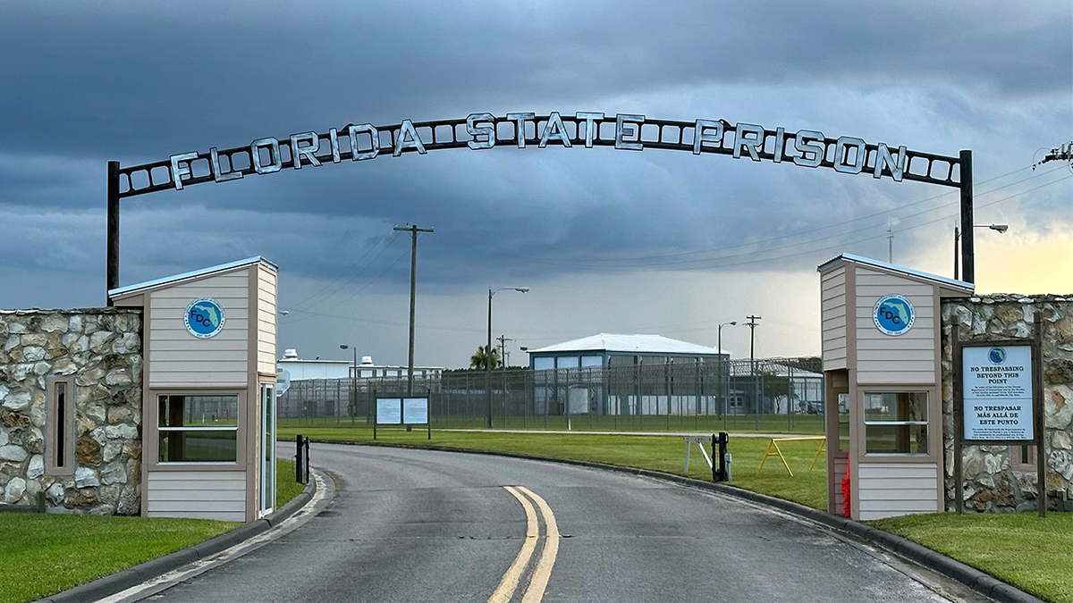 Clouds hovering over the entrance of Florida State Prison in Starke, Fla.
