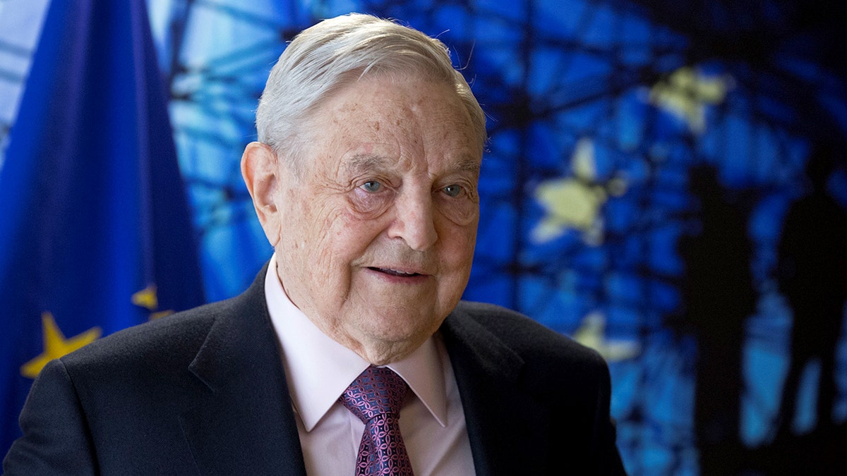 George Soros arriving at a meeting in Brussels, Belgium