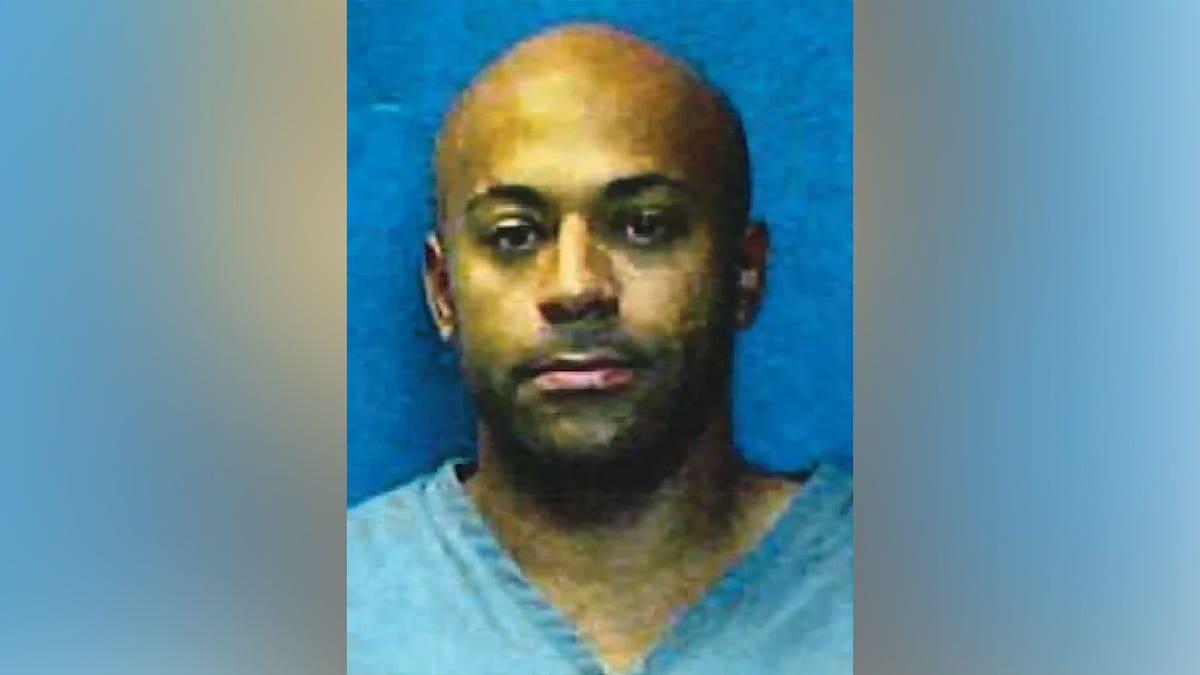 Miguel Cruz standing in a courtroom