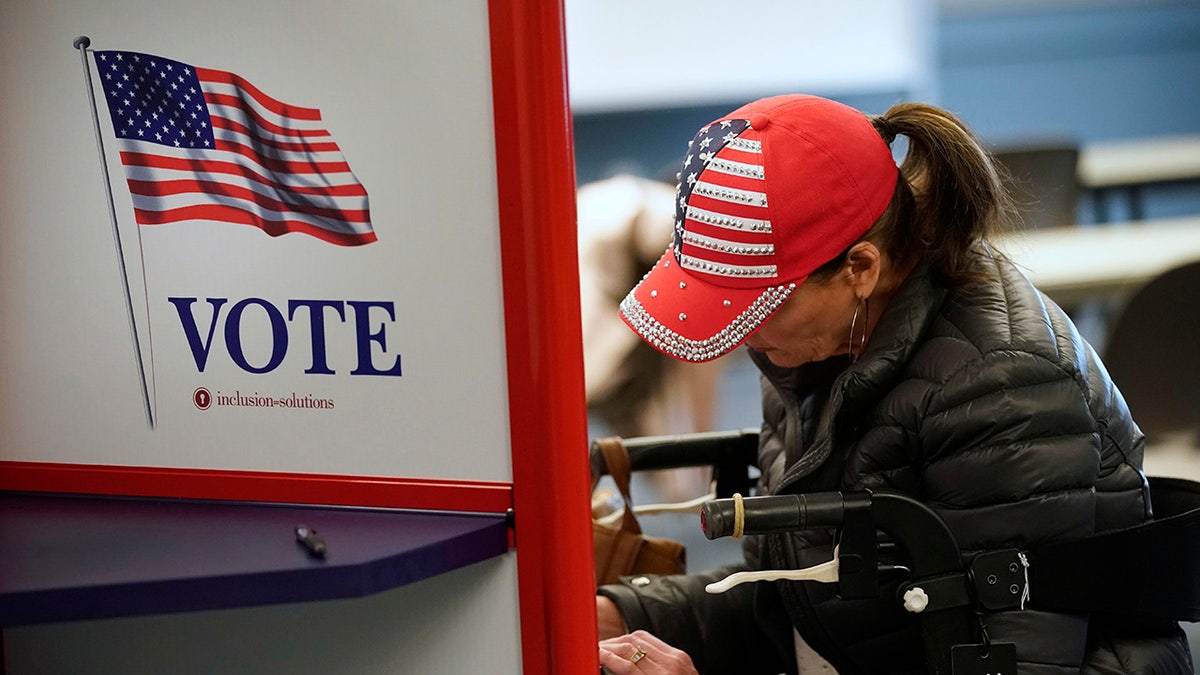 Voters casting ballots at Utah County Justice and Health Center in Provo