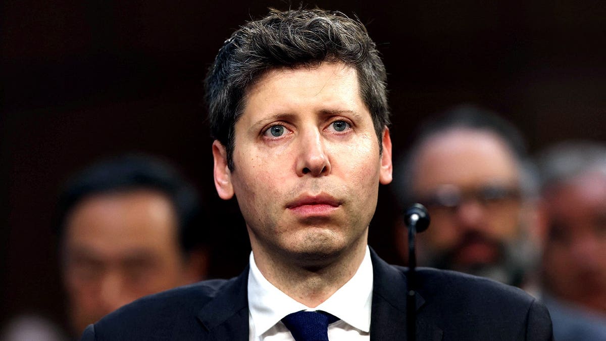 OpenAI CEO Sam Altman seated testifying before Senate Commerce Committee hearing in Washington D.C.