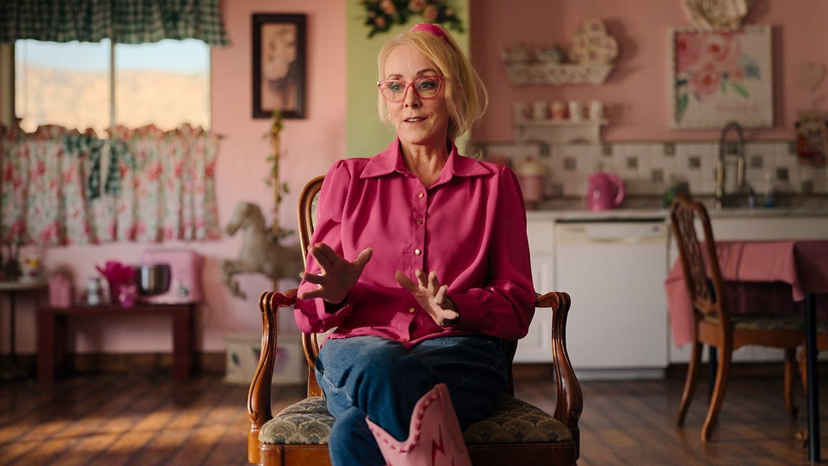 Christine Marie standing in a scene from Trust Me: The False Prophet Season 1