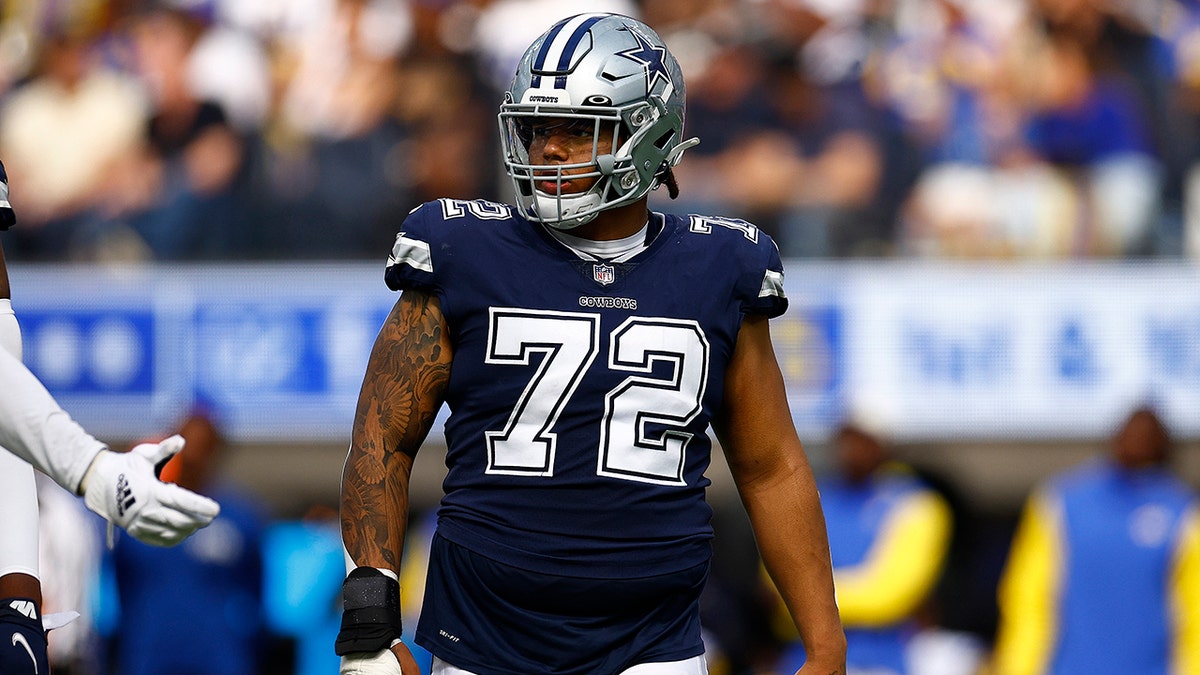 Trysten Hill looks on during a Dallas Cowboys game
