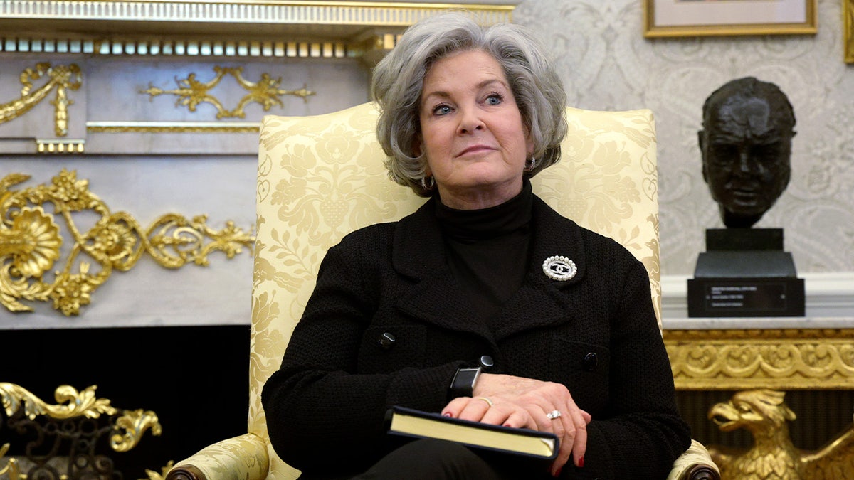 White House chief of staff Susie Wiles listening in the Oval Office