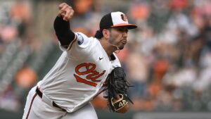 Orioles pitcher takes part in gender reveal as he walks off mound following relief appearance