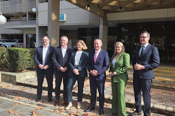 WA Premier Roger Cook, Treasurer Rita Saffioti, Health Infrastructure Minister John Carey and Health Minister Meredith Hammat with Bethesda Health Care Executive Director Neale Fong and Mount Hospital general manager Patrick Turner outside the hospital on Thursday.