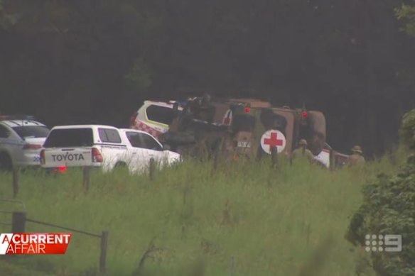 Emergency vehicles help the injured soldiers.