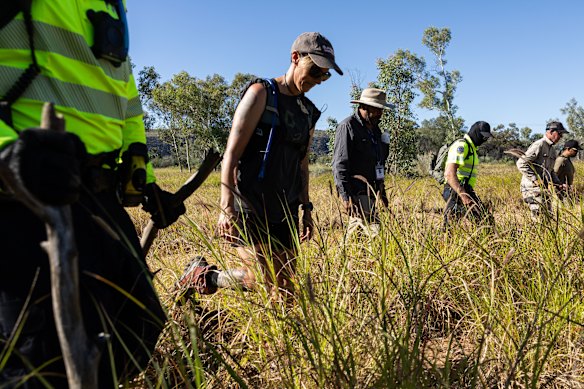 Members of the Northern Territory Police and emergency services volunteers during the search for Kumanjayi Little Baby.