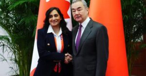 Chinese interference ‘systemic,’ report says as minister returns to Canada