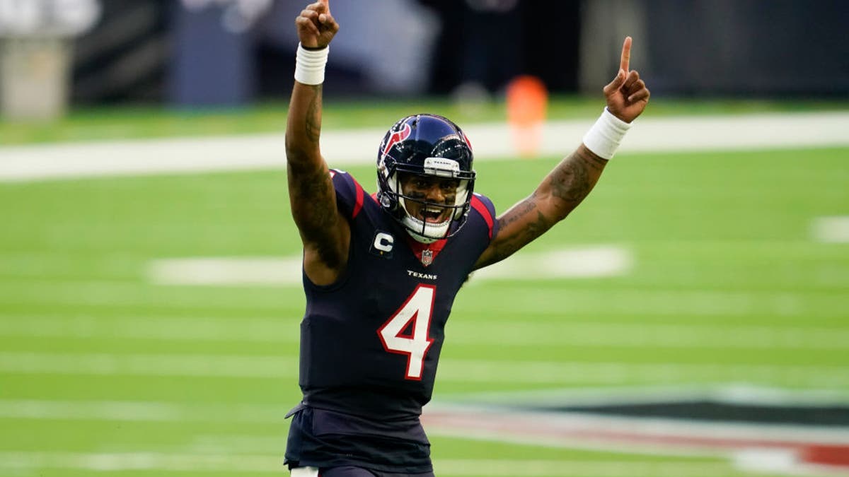 Deshaun Watson #4 of the Houston Texans celebrates during an NFL game against the Tennessee Titans on January 03, 2021 in Houston, Texas. (Photo by Cooper Neill/Getty Images)