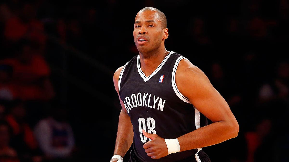 Jason Collins of the Brooklyn Nets running on the basketball court at Madison Square Garden