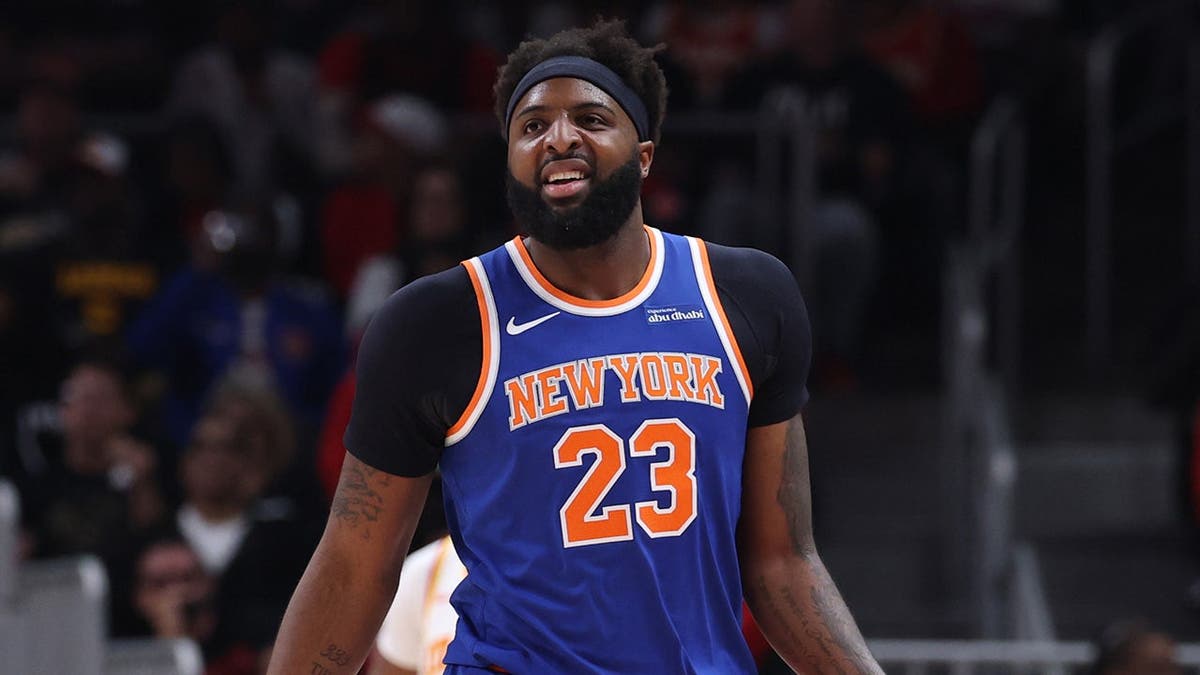 Mitchell Robinson of the New York Knicks reacts during a basketball game at State Farm Arena in Atlanta