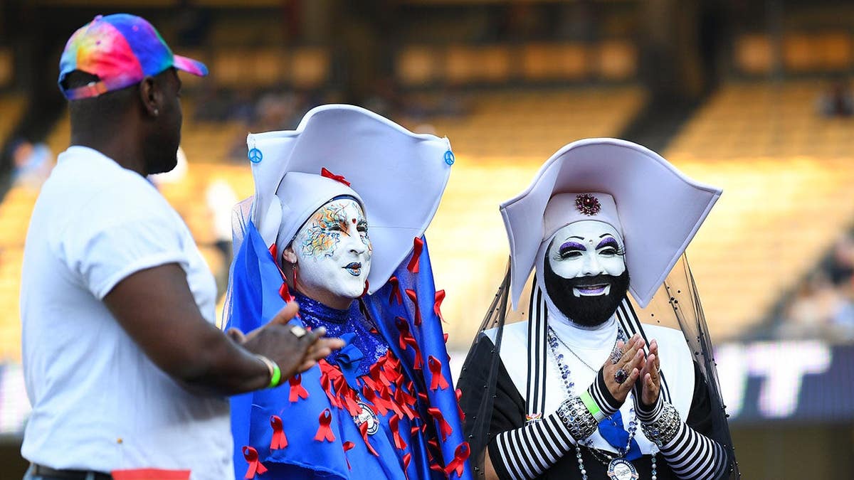 Sister Unity and Sister Dominia of the Sisters of Perpetual Indulgence standing at Dodger Stadium