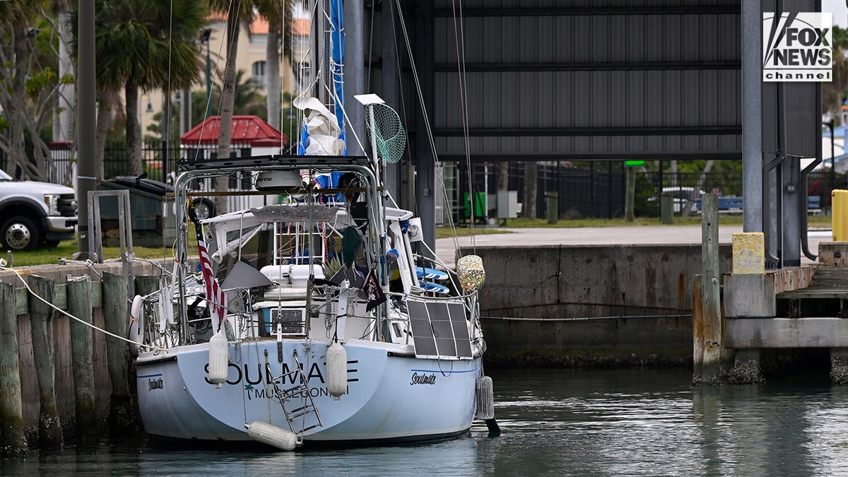 The yacht Soulmate moored at a U.S. Coast Guard station dock.