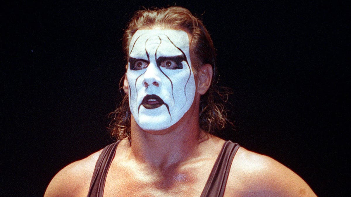 Wrestler Sting standing in a wrestling ring at the Cow Palace.