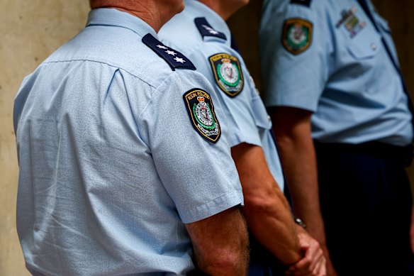 File image of NSW Police officers. A report has found the force is a high-conflict workforce with “authoritarian” leadership styles.
