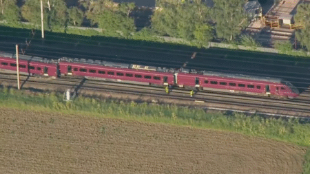 Two-train crash leaves at least 1 dead, 89 injured as emergency crews rush to chaotic scene