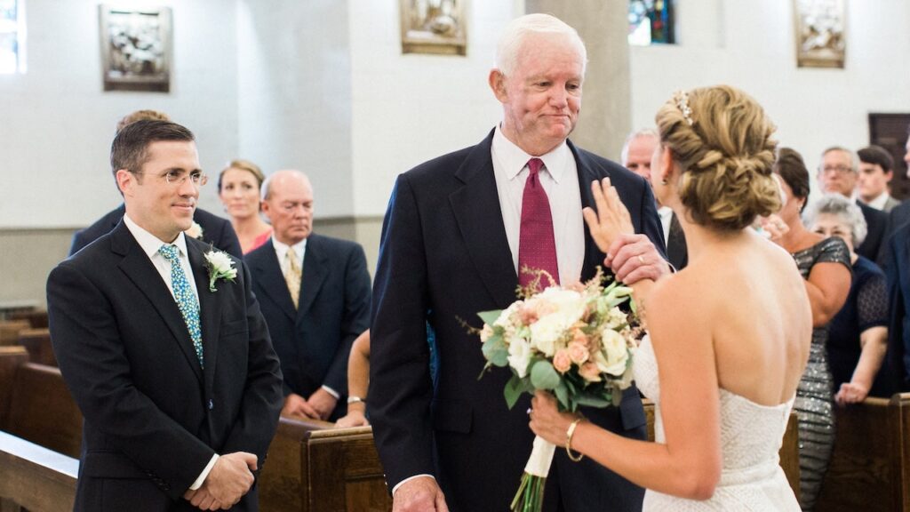 Bride is walked down wedding aisle by man who received her late father's heart