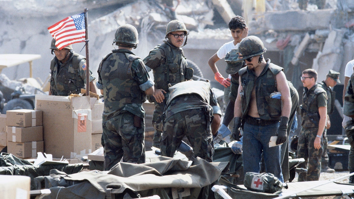 American Marines searching rubble of destroyed barracks in Beirut airport