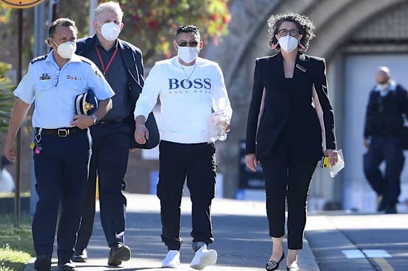 Mohammed Skaf (centre) was released on parole from the Long Bay prison in 2021 after serving more than 20 years of a 23-year sentence for gang rapes.