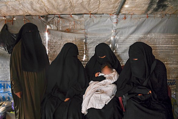 Sahra Ahmed (left), Kawsar Abbas (2nd from left), Aisha Ahmed (2nd from right) Zeinab Ahmad (right) in al Hawl camp in north-east Syria in 2019.