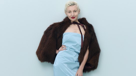 Common Hours dress. Levante tights. Zara sandals. Her own faux fur cape.