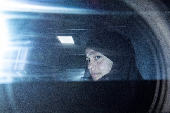 Zeinab Ahmad, one of two women linked to alleged Islamic State jihadists, is seen being taken away in an armoured police vehicle outside the Melbourne Magistrates’ Court in Melbourne on May 8.