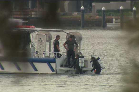 Police divers in Concord on Saturday.