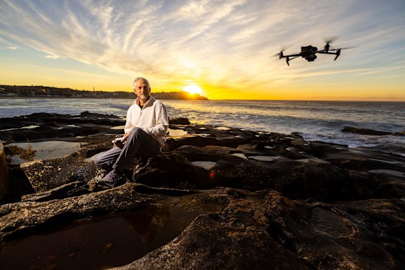 Jason Iggleden monitors beaches by drones most mornings.