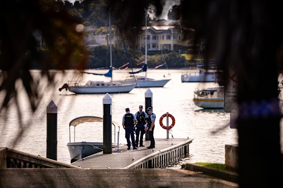A police search takes place after a man’s body was found at the dock of Bayview Park on Saturday, June 13.