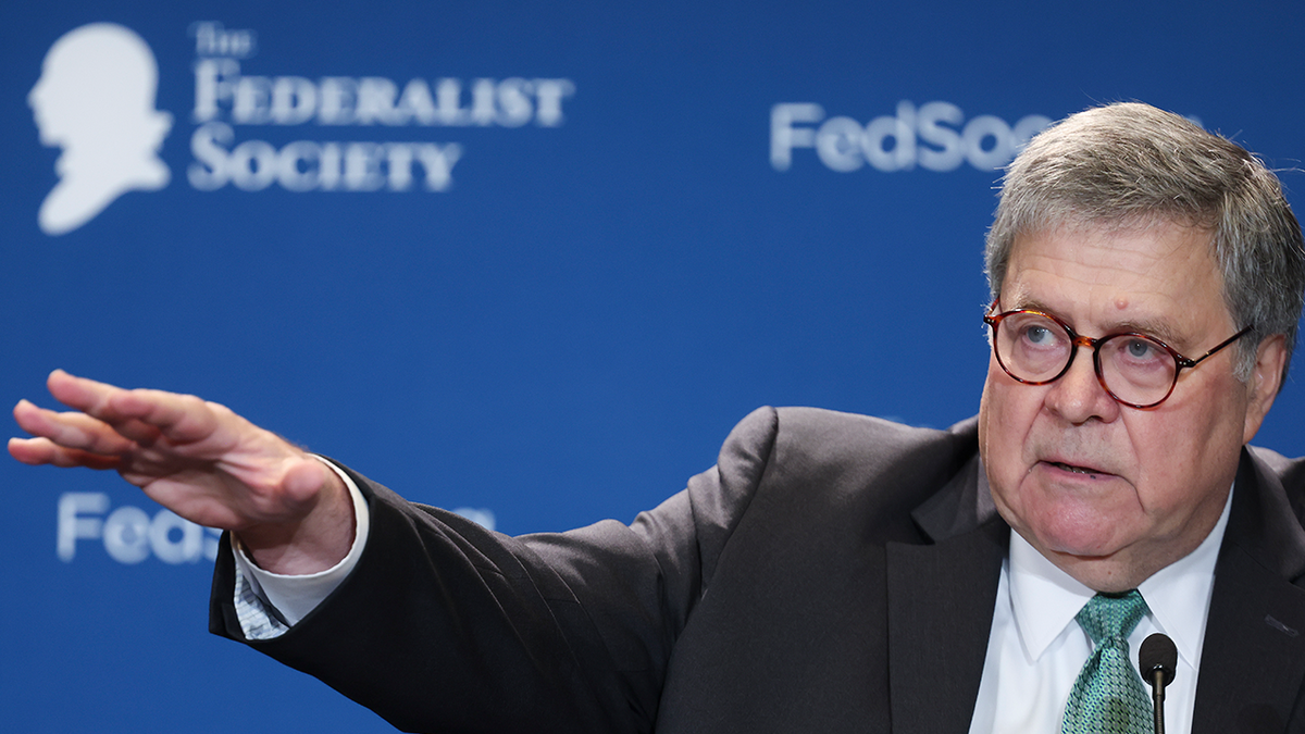 Former Attorney General William Barr speaking at a Federalist Society meeting in Washington, D.C.