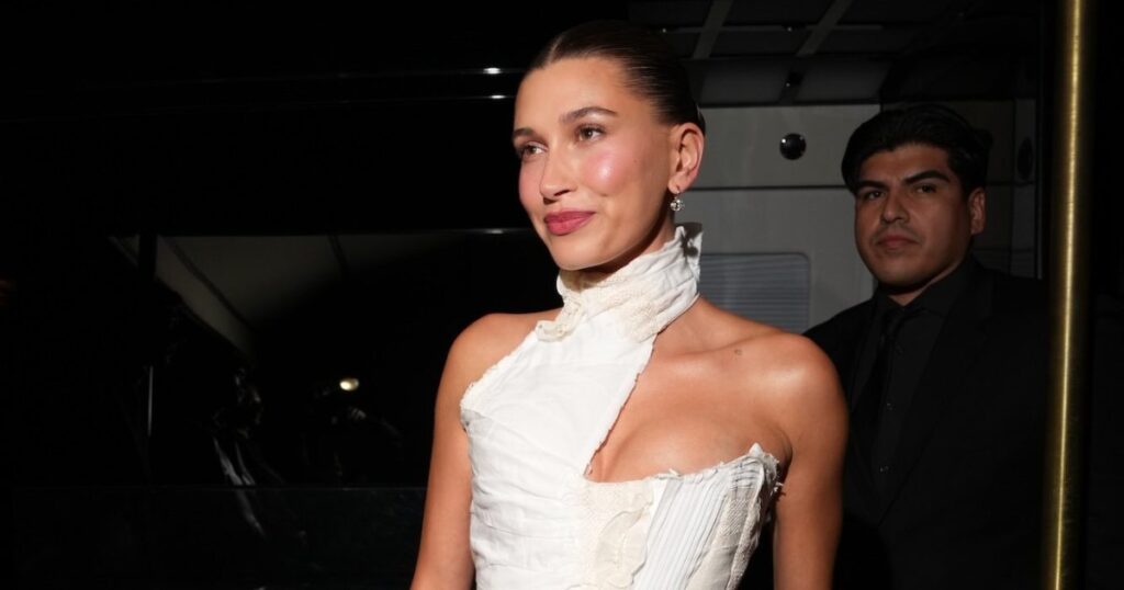 Hailey Bieber Shows Off Figure in Cheeky Bikini Photo to Kick Off a ‘Rhode Summer’