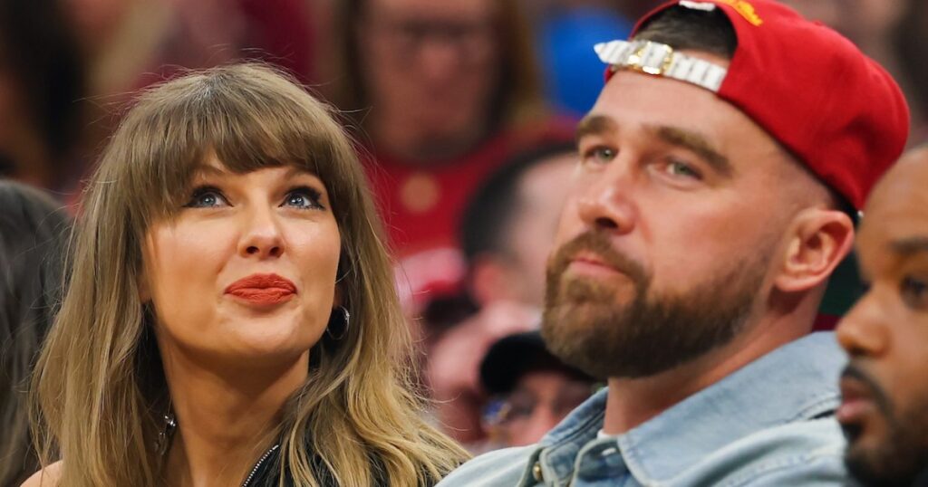 Travis Kelce Shows Footage of Taylor Swift Feeding Him During His ‘New Heights’ Live Show