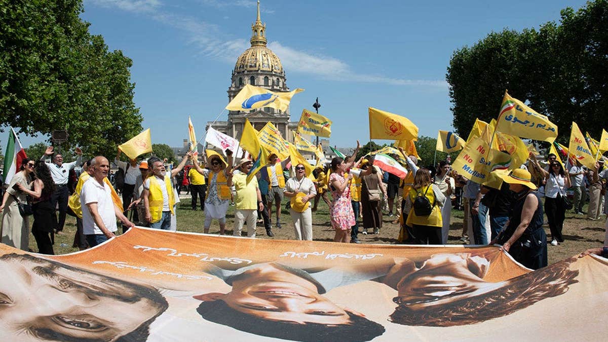 Supporters of the National Council of Resistance of Iran gather in Paris